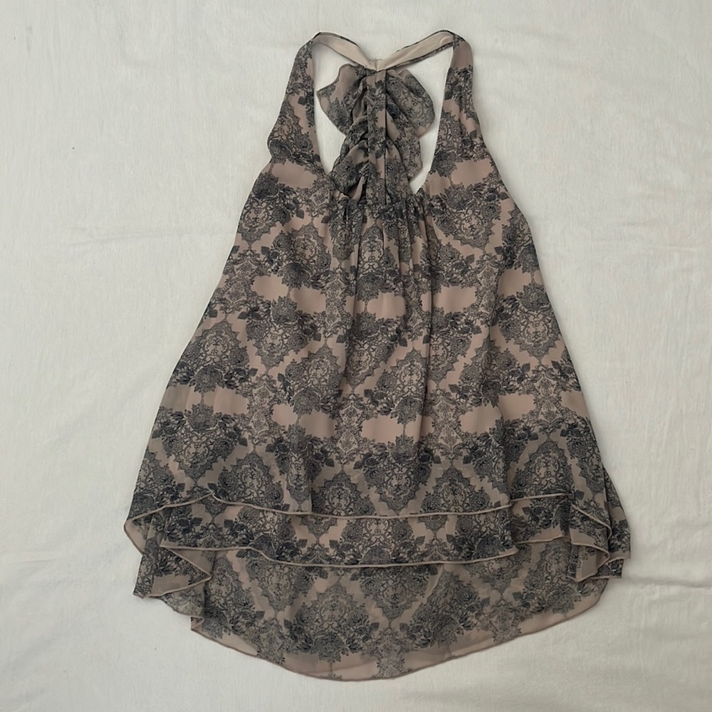 Blouse with ruffled back